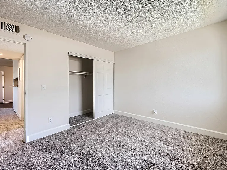 Step into this cozy bedroom retreat, perfect for relaxation and personal space.