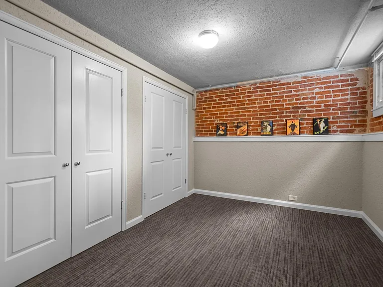 4th bedroom, is in the basement. It has TWO closets.