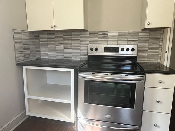 SS Stove. Built-in for microwave.