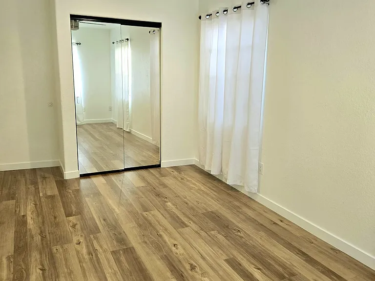 Bedroom 3 - new paint, new floors, new closet doors, new light fixture. 
ALL NEW AND CLEAN.