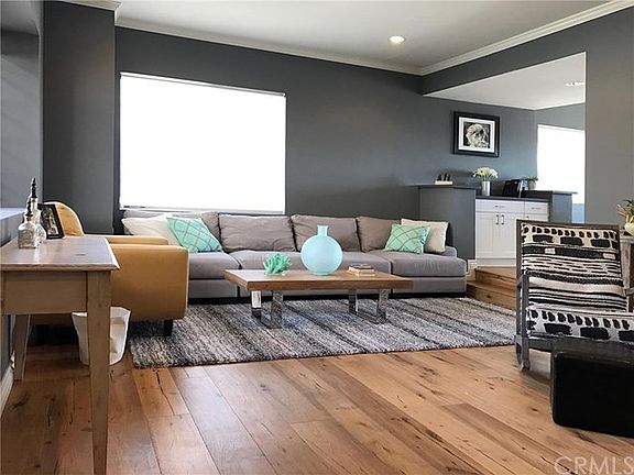 Spacious, Light Filled Living Room Showcases New Wide Plank