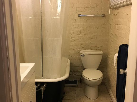 Bathroom with claw foot tub