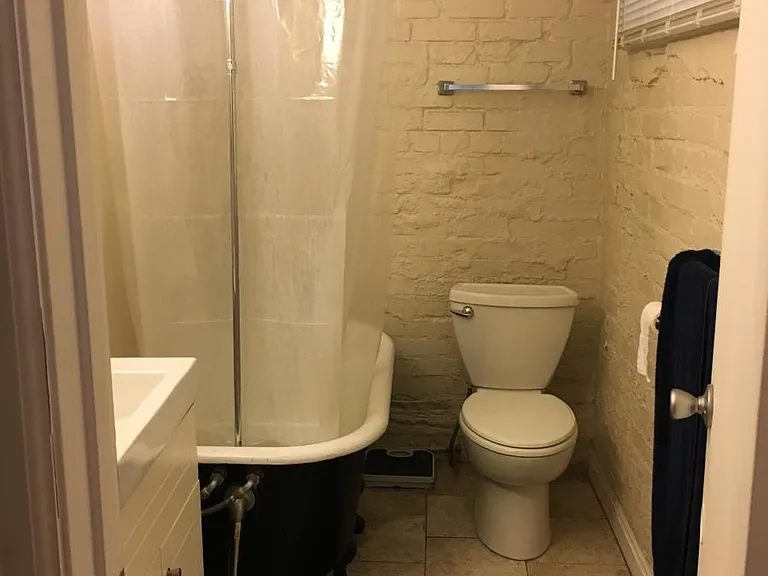 Bathroom with claw foot tub