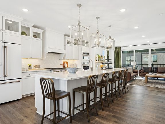 Kitchen with pendant lights over island