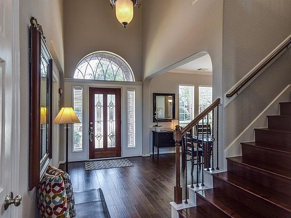 The warm hardwoods greet you as you enter and continue throughout this home.