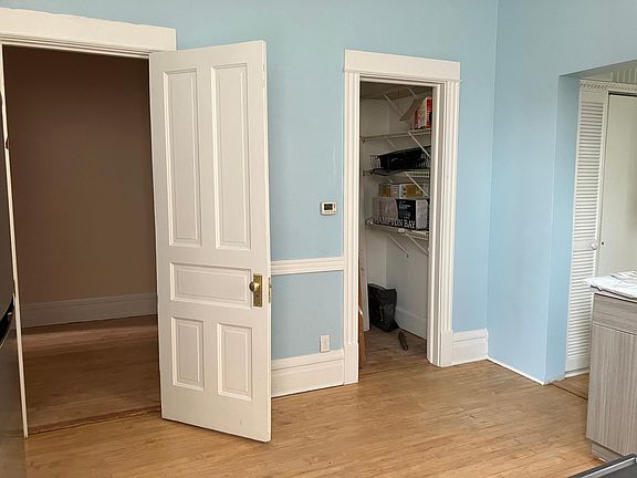 kitchen with bedroom and pantry