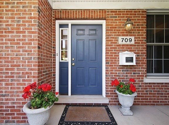 Welcoming, covered, wrap-around front porch