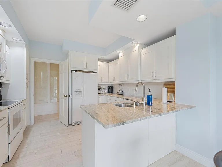 11875 Pebblewood Dr #201 — Photo 16