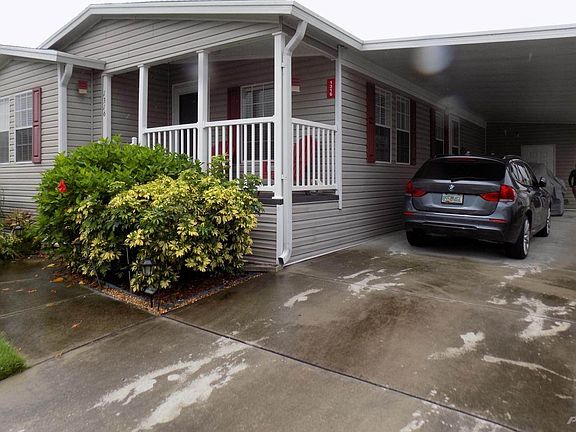 LARGE CARPORT/ FRONT PATIO