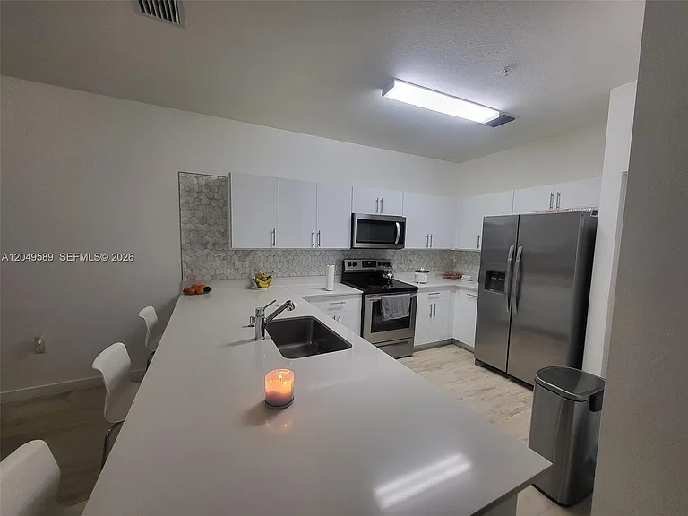 15540 SW 136th St #109 — Photo 3