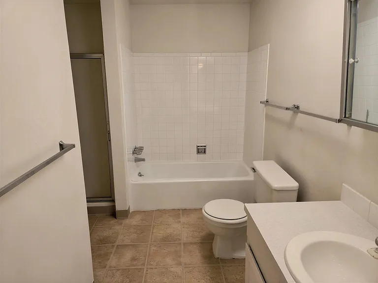 Unit #3 full bath with separate shower and bathtub