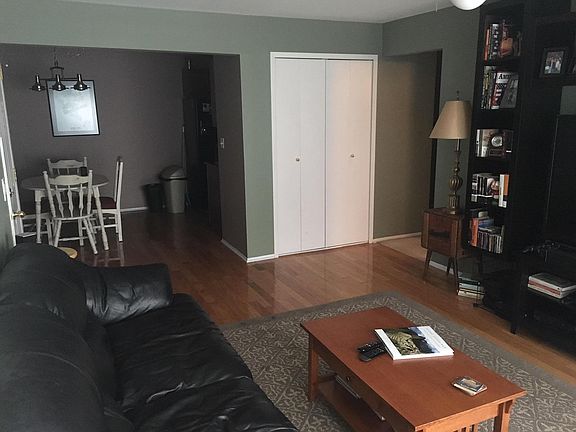 Living room and view into dining area