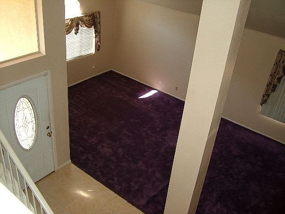 View of spacious living room from 2nd story