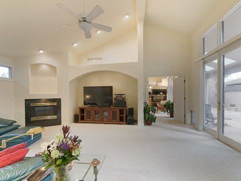 FAMILY ROOM & GLASS DOORS TO COURTYARD