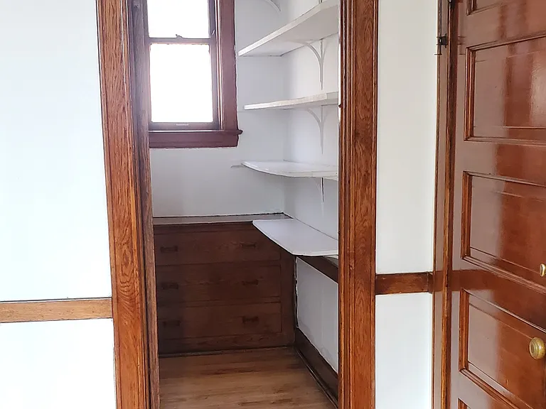 Pantry: Super large Pantry w. window & door (off Kitchen). Back door on right leads to large, light, enclosed back porch & to basement Laundry-room.