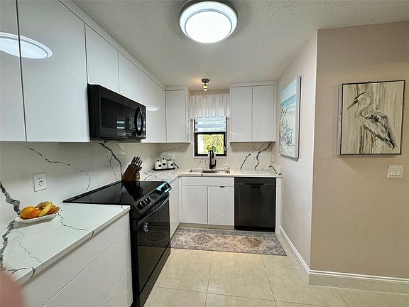2nd image of 2440 Deer Creek Country Club Boulevard #305