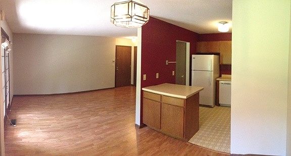 wide angle of kitchen and living room