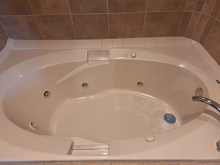 Jetted garden tub in front master bathroom.