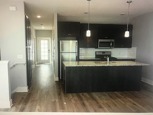 6875 Village Dr SE #6875 Photo 1