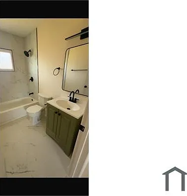 1239 E Northern Pkwy — Photo 1