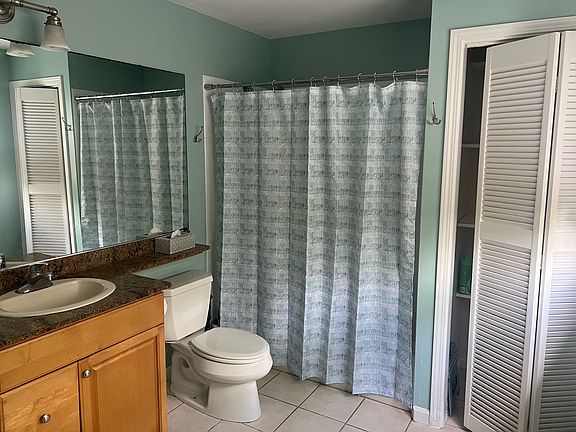 2nd view of bathroom w/ storage