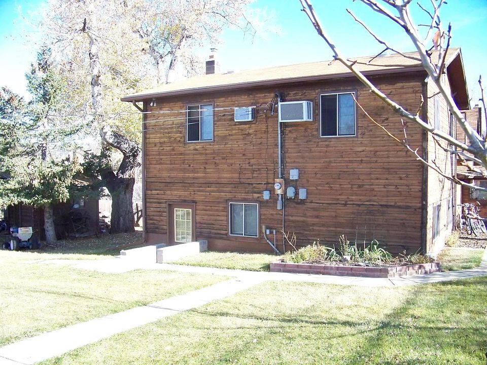 Back side of house has entry door
