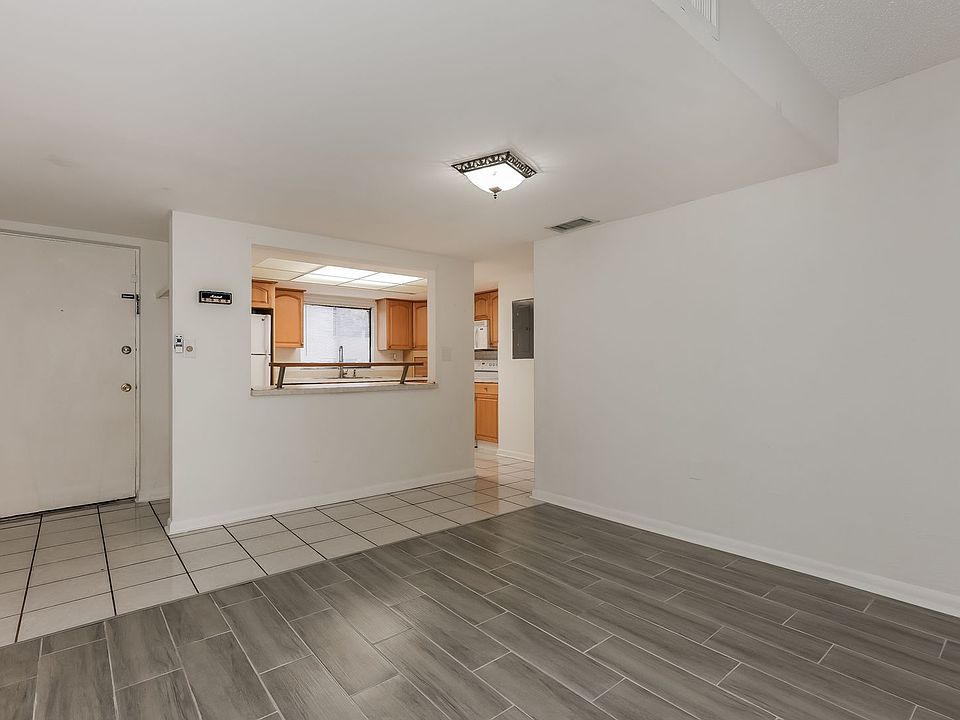 1st image of 10775 Village Club Cir #101