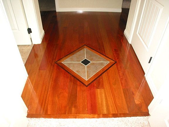 Knotty Alder floors w/ tile inlet