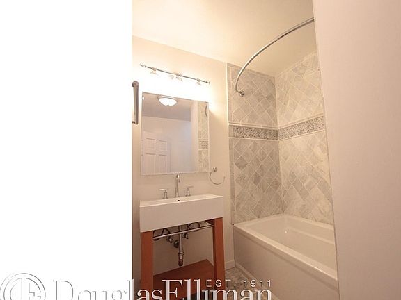 4th image of 463 W 49th St APT 4