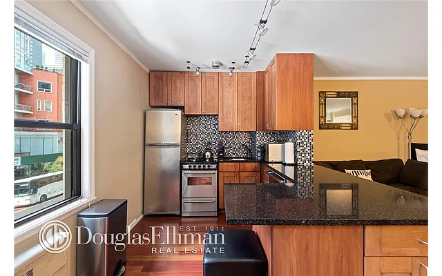 Sold by Douglas Elliman | media 12