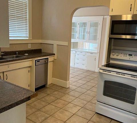 kitchen leading to breakfast nook