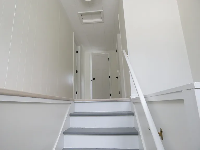 Third (3rd) floor hallway - Full bath at the end of the hall - bedroom to the left - There is a fire escape from this 3rd floor to the ground