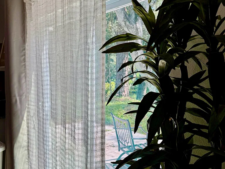 Large sliding doors to private furnished marble patio!