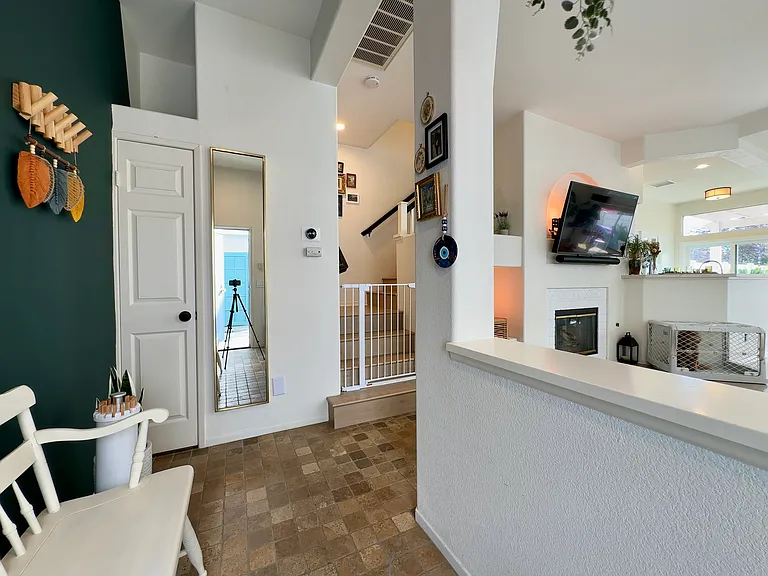 Entryway opening up to the living room