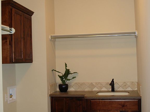 Utility room with sink