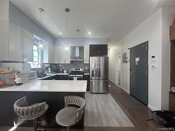 4th image of 58-62 Fresh Pond Rd #A