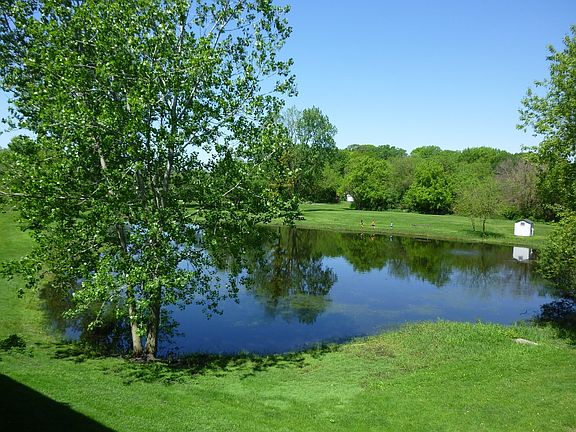 Serene view from main floor living room, deck and lower level Patio