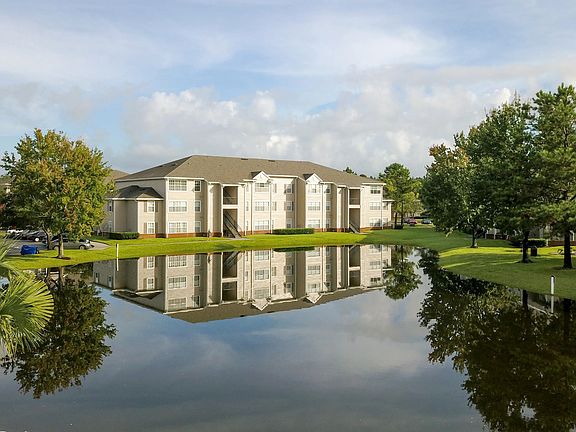 Unwind in a picturesque setting where nature and luxury meet in perfect harmony found in serene lake views from around the idyllic community.