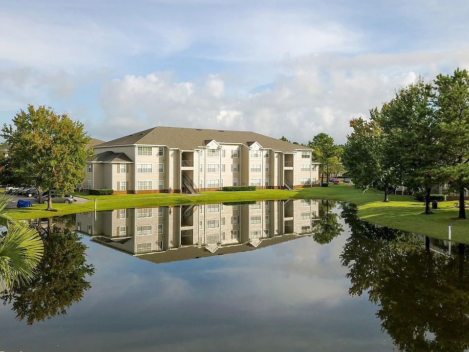 Unwind in a picturesque setting where nature and luxury meet in perfect harmony found in serene lake views from around the idyllic community.