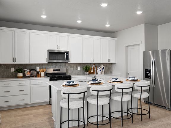 The Pine floorplan interior image taken at a Meritage Homes Community in Eagle Mountain, UT.