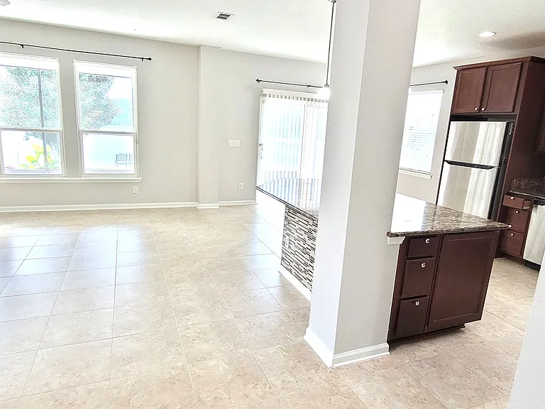 Living room and kitchen freshly repainted with modern color