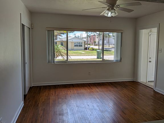 This is a view of the living room from the kitchen pass through.