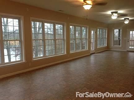 Sun Room : This beautiful sun room over looks the lake.