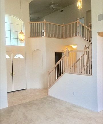 Downstairs grand entry with double doors