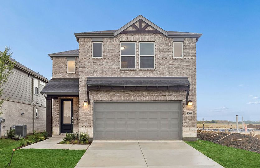 The Ouray, a two story home with a two car garage