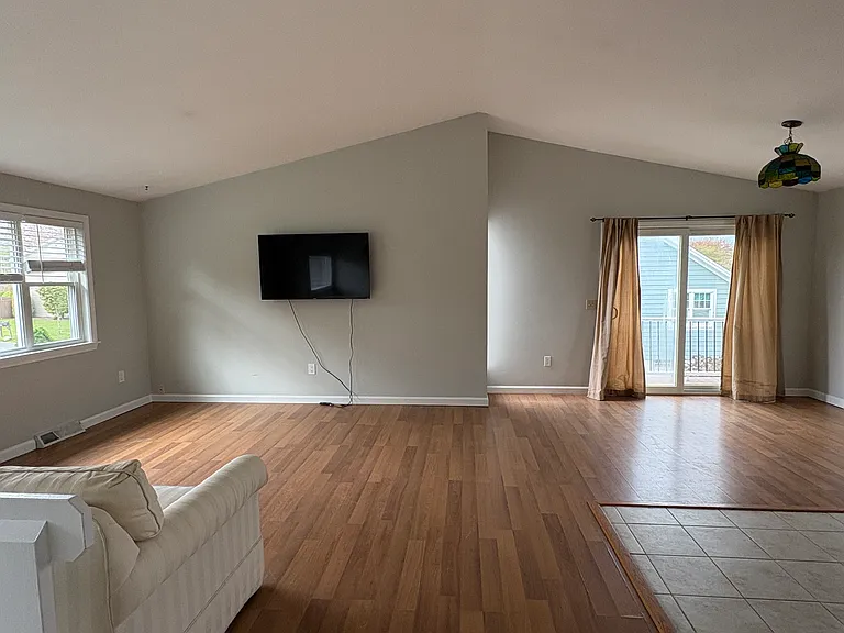 Living room with wall mounted TV