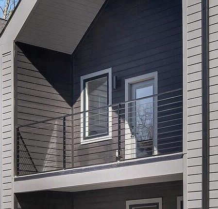 The bottom level provides ample outdoor covered patio space