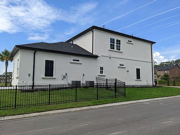 End unit, corner lot.