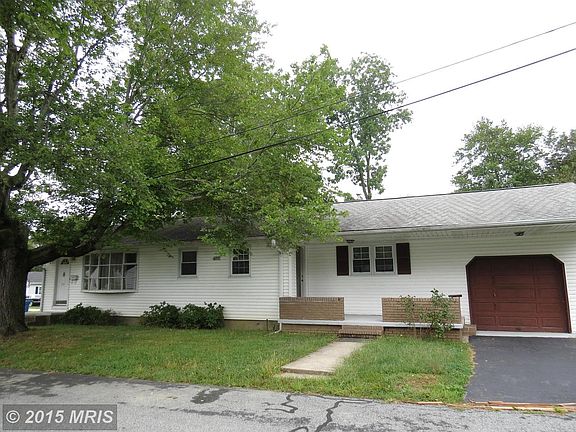 COVERED FRONT PORCH, GARAGE
