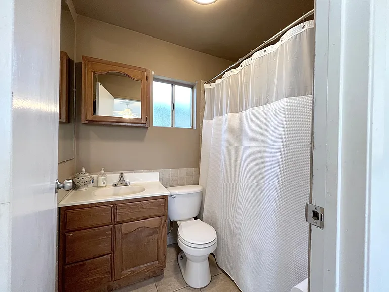 Bedroom 3: Master with full ensuite bath